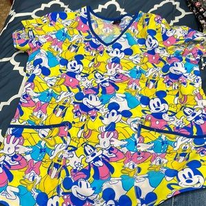 Gently used Disney scrub top size M